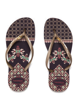 Slim Royal - predominant colour: gold; occasions: casual, holiday; material: plastic/rubber; heel height: flat; heel: standard; toe: toe thongs; style: flip flops; trends: statement prints, metallics; finish: plain; pattern: plain; season: s/s 2013