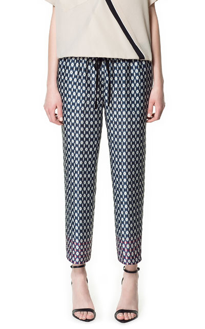 Contrasting Print Trousers - waist detail: belted waist/tie at waist/drawstring; waist: mid/regular rise; predominant colour: navy; occasions: casual, evening, work, holiday; length: ankle length; fibres: polyester/polyamide - 100%; trends: statement prints; fit: slim leg; pattern type: fabric; pattern: patterned/print; texture group: other - light to midweight; style: standard; season: s/s 2013; pattern size: standard (bottom)