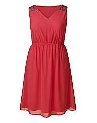 Embellished Dress 41in - style: faux wrap/wrap; neckline: v-neck; fit: fitted at waist; pattern: plain; sleeve style: sleeveless; waist detail: elasticated waist; predominant colour: true red; occasions: evening; length: just above the knee; fibres: polyester/polyamide - 100%; hip detail: soft pleats at hip/draping at hip/flared at hip; shoulder detail: added shoulder detail; sleeve length: sleeveless; texture group: sheer fabrics/chiffon/organza etc.; pattern type: fabric; embellishment: sequins; season: s/s 2014