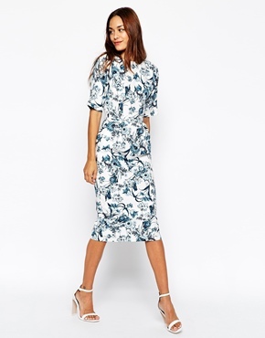 Wiggle Dress In Texture With Blue Floral Print Blue Print - length: below the knee; fit: tailored/fitted; style: bodycon; predominant colour: white; secondary colour: navy; occasions: evening, occasion; fibres: cotton - 100%; neckline: crew; sleeve length: half sleeve; sleeve style: standard; texture group: cotton feel fabrics; pattern type: fabric; pattern: florals; season: s/s 2015