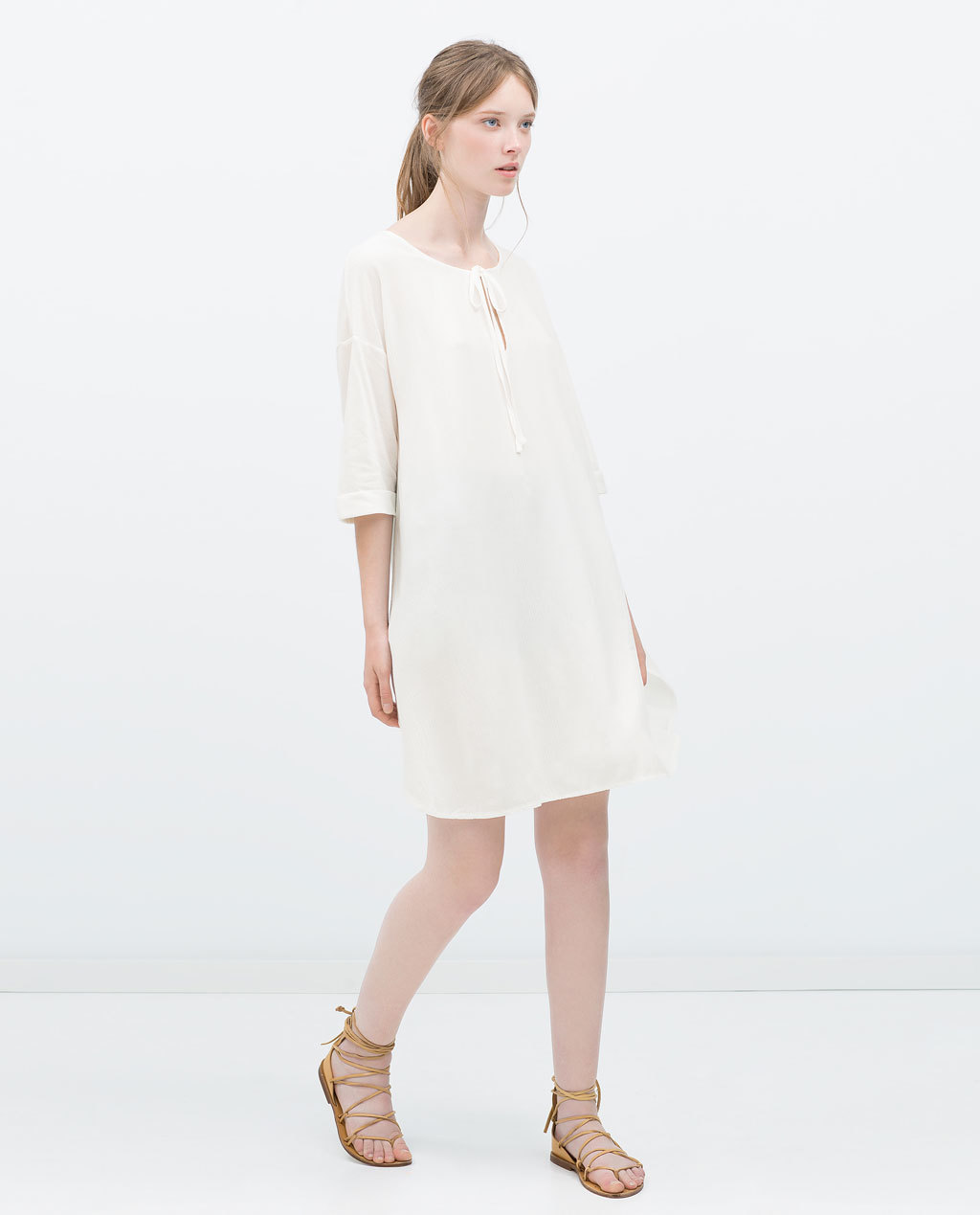 Combined Kaftan T Shirt - neckline: round neck; fit: loose; pattern: plain; style: kaftan; predominant colour: ivory/cream; length: just above the knee; sleeve length: 3/4 length; sleeve style: standard; texture group: sheer fabrics/chiffon/organza etc.; occasions: holiday; pattern type: fabric; fibres: viscose/rayon - mix; season: s/s 2015