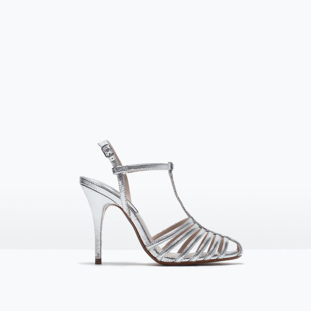 High Heel T Bar Shoes - predominant colour: silver; occasions: evening, occasion; material: faux leather; heel height: high; heel: stiletto; style: strappy; finish: metallic; pattern: plain; toe: caged; season: s/s 2015; wardrobe: event