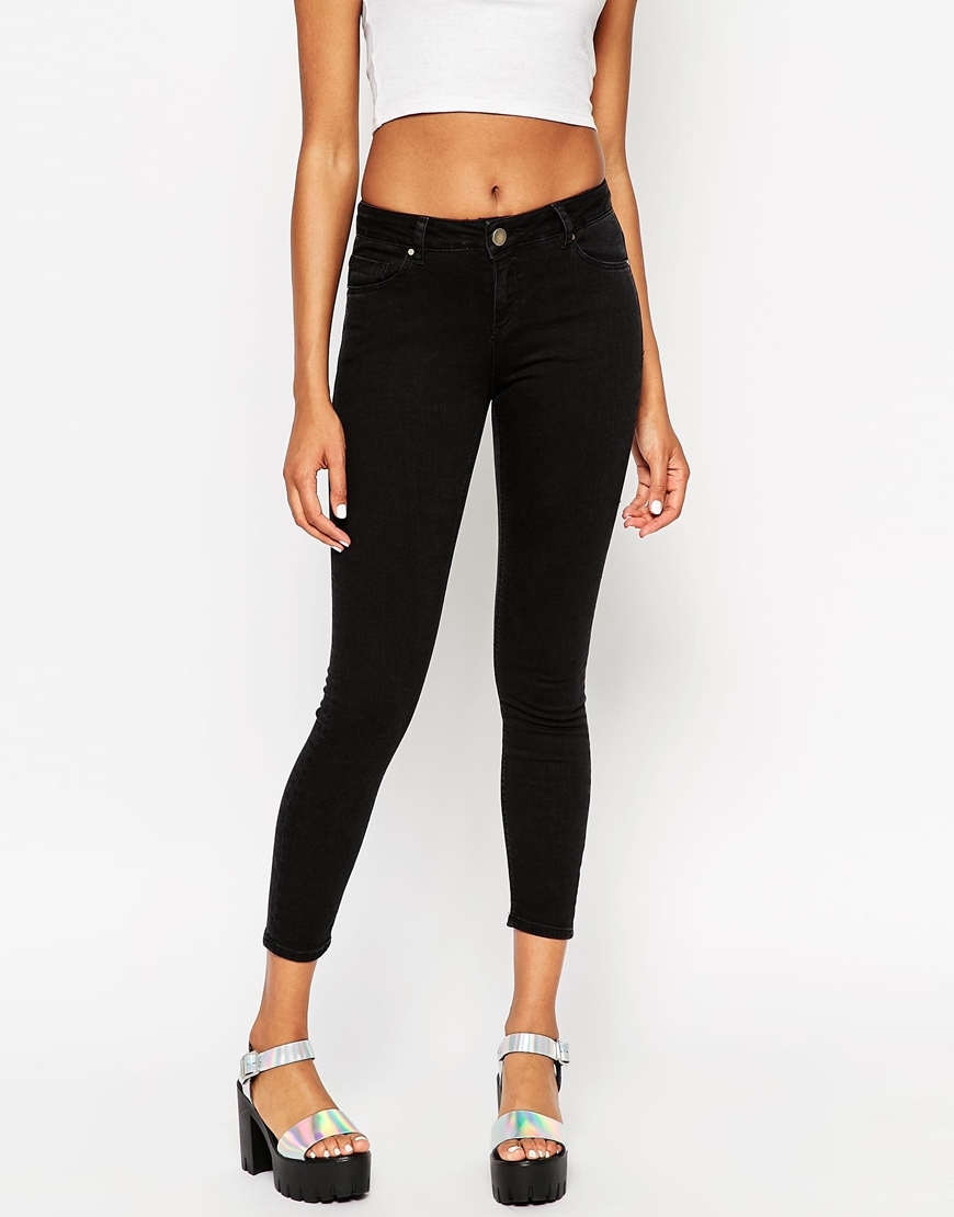 Lisbon Midrise Skinny Jeans In Washed Black Washed Black - style: skinny leg; pattern: plain; pocket detail: traditional 5 pocket; waist: mid/regular rise; predominant colour: black; occasions: casual, evening; length: calf length; fibres: cotton - 100%; texture group: denim; pattern type: fabric; season: s/s 2015