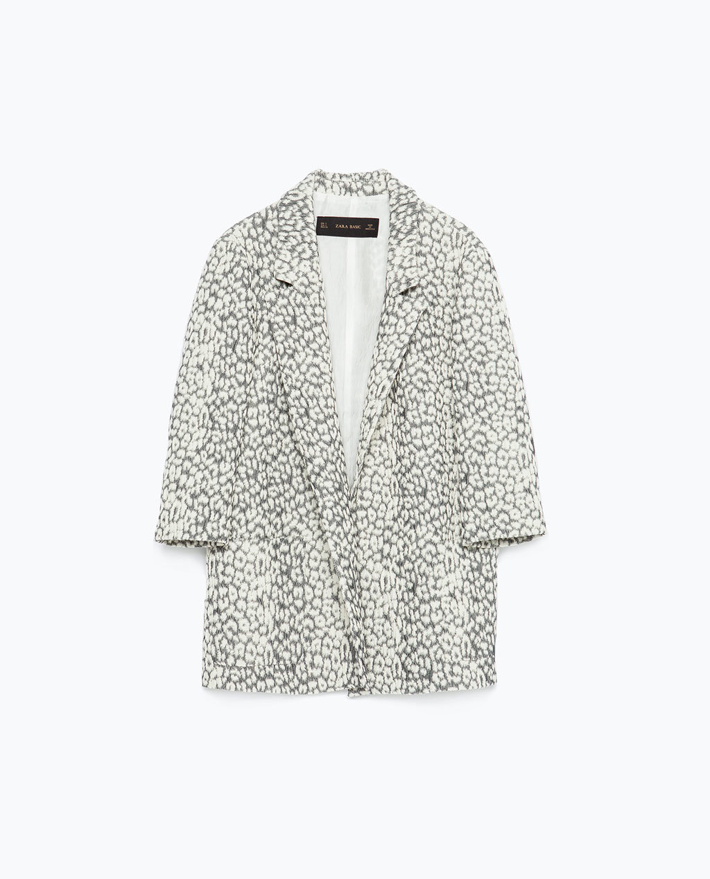 Long Blazer - style: single breasted blazer; collar: standard lapel/rever collar; length: below the knee; predominant colour: white; secondary colour: charcoal; occasions: casual, creative work; fit: straight cut (boxy); sleeve length: 3/4 length; sleeve style: standard; collar break: low/open; pattern type: fabric; pattern size: standard; pattern: animal print; texture group: woven light midweight; fibres: pvc/polyurethene - mix; season: s/s 2015; wardrobe: highlight