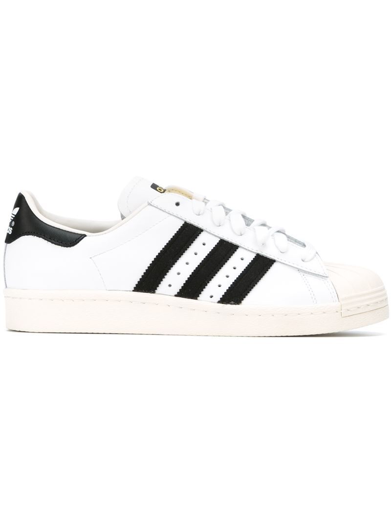 'superstar 80's' Sneakers, Adult Unisex, Size: 5.5, White - predominant colour: white; secondary colour: black; occasions: casual, activity; material: leather; heel height: flat; toe: round toe; style: trainers; trends: monochrome; finish: plain; pattern: striped; shoe detail: moulded soul; season: s/s 2015