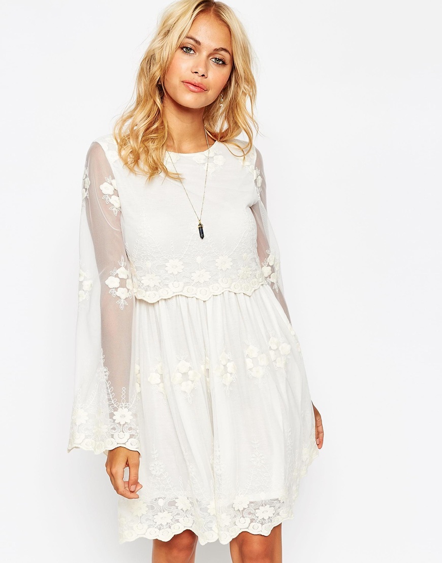 Skater Dress In Lace With Double Layer Cream - neckline: round neck; sleeve style: angel/waterfall; pattern: plain; predominant colour: ivory/cream; length: just above the knee; fit: soft a-line; style: fit & flare; occasions: occasion; sleeve length: long sleeve; texture group: sheer fabrics/chiffon/organza etc.; pattern type: fabric; embellishment: embroidered; season: a/w 2015