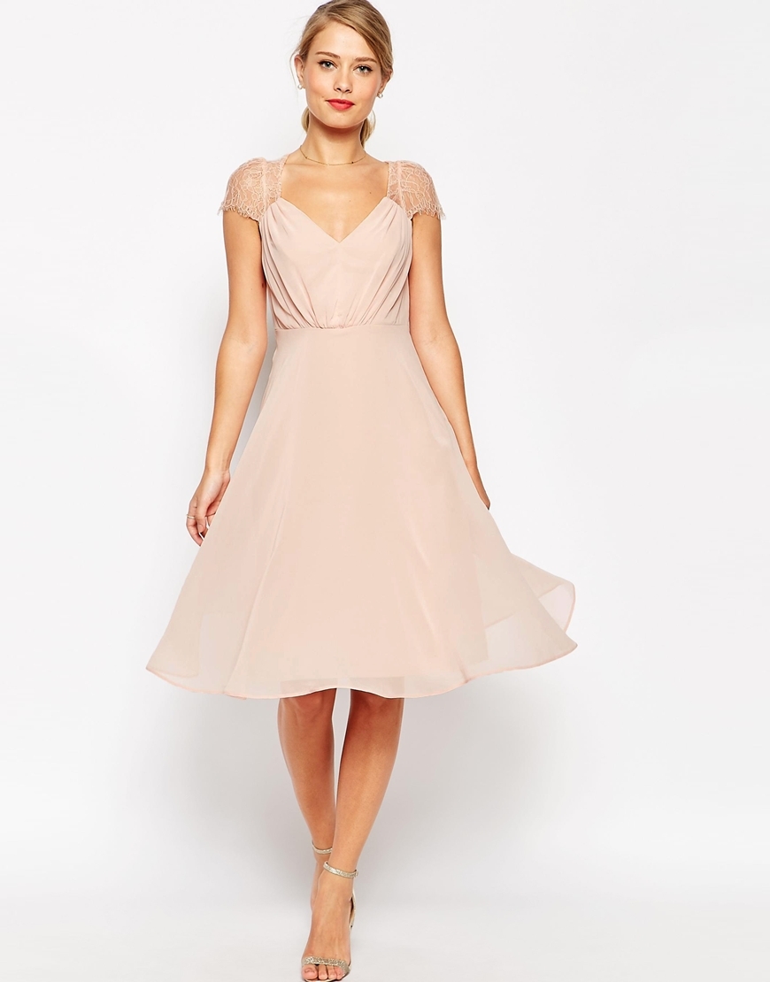 Kate Lace Midi Dress Nude - neckline: v-neck; sleeve style: capped; pattern: plain; predominant colour: blush; occasions: evening, occasion; length: on the knee; fit: fitted at waist & bust; style: fit & flare; fibres: polyester/polyamide - 100%; hip detail: soft pleats at hip/draping at hip/flared at hip; sleeve length: short sleeve; texture group: sheer fabrics/chiffon/organza etc.; pattern type: fabric; embellishment: lace; season: a/w 2015