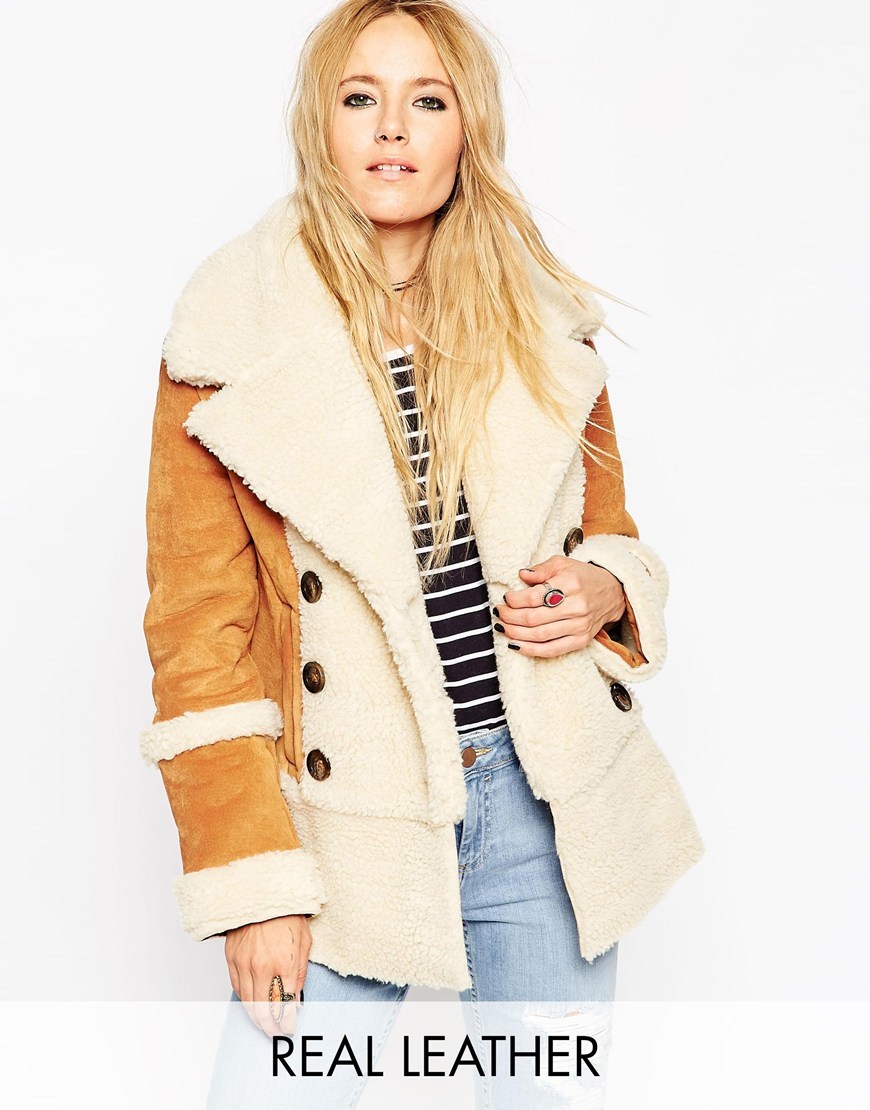 Suede Shearling Coat In 70's Styling Tan - length: below the bottom; collar: wide lapels; style: double breasted; predominant colour: camel; occasions: casual, creative work; fit: straight cut (boxy); sleeve length: long sleeve; sleeve style: standard; collar break: low/open; pattern type: fabric; pattern size: standard; pattern: colourblock; texture group: sheepskin; season: a/w 2015