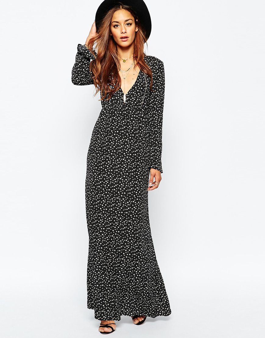 Plunge Boho Maxi Dress Black - neckline: low v-neck; style: maxi dress; secondary colour: white; predominant colour: black; occasions: evening, creative work; length: floor length; fit: body skimming; fibres: polyester/polyamide - 100%; sleeve length: long sleeve; sleeve style: standard; pattern type: fabric; pattern: patterned/print; texture group: woven light midweight; multicoloured: multicoloured; season: a/w 2015