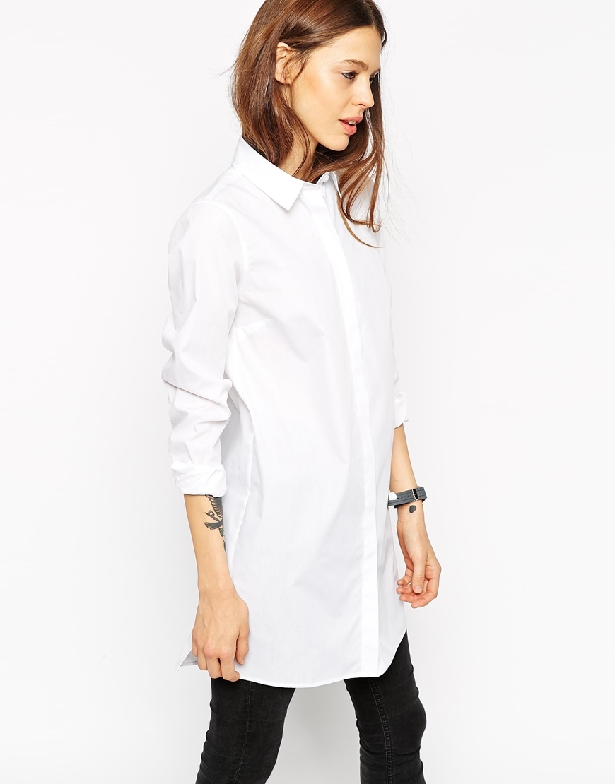 Longline White Shirt White - neckline: shirt collar/peter pan/zip with opening; pattern: plain; length: below the bottom; style: shirt; predominant colour: white; occasions: casual, evening, creative work; fibres: cotton - stretch; fit: straight cut; sleeve length: 3/4 length; sleeve style: standard; texture group: cotton feel fabrics; pattern type: fabric; season: a/w 2015