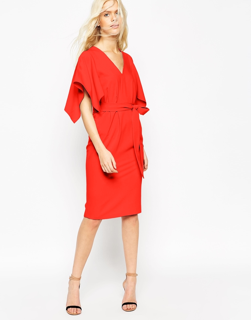 Angel Kimono Sleeve Belted Midi Dress Blood Orange - style: faux wrap/wrap; neckline: v-neck; pattern: plain; sleeve style: kimono; waist detail: belted waist/tie at waist/drawstring; predominant colour: bright orange; occasions: evening; length: on the knee; fit: body skimming; fibres: polyester/polyamide - stretch; sleeve length: half sleeve; texture group: crepes; pattern type: fabric; season: a/w 2015