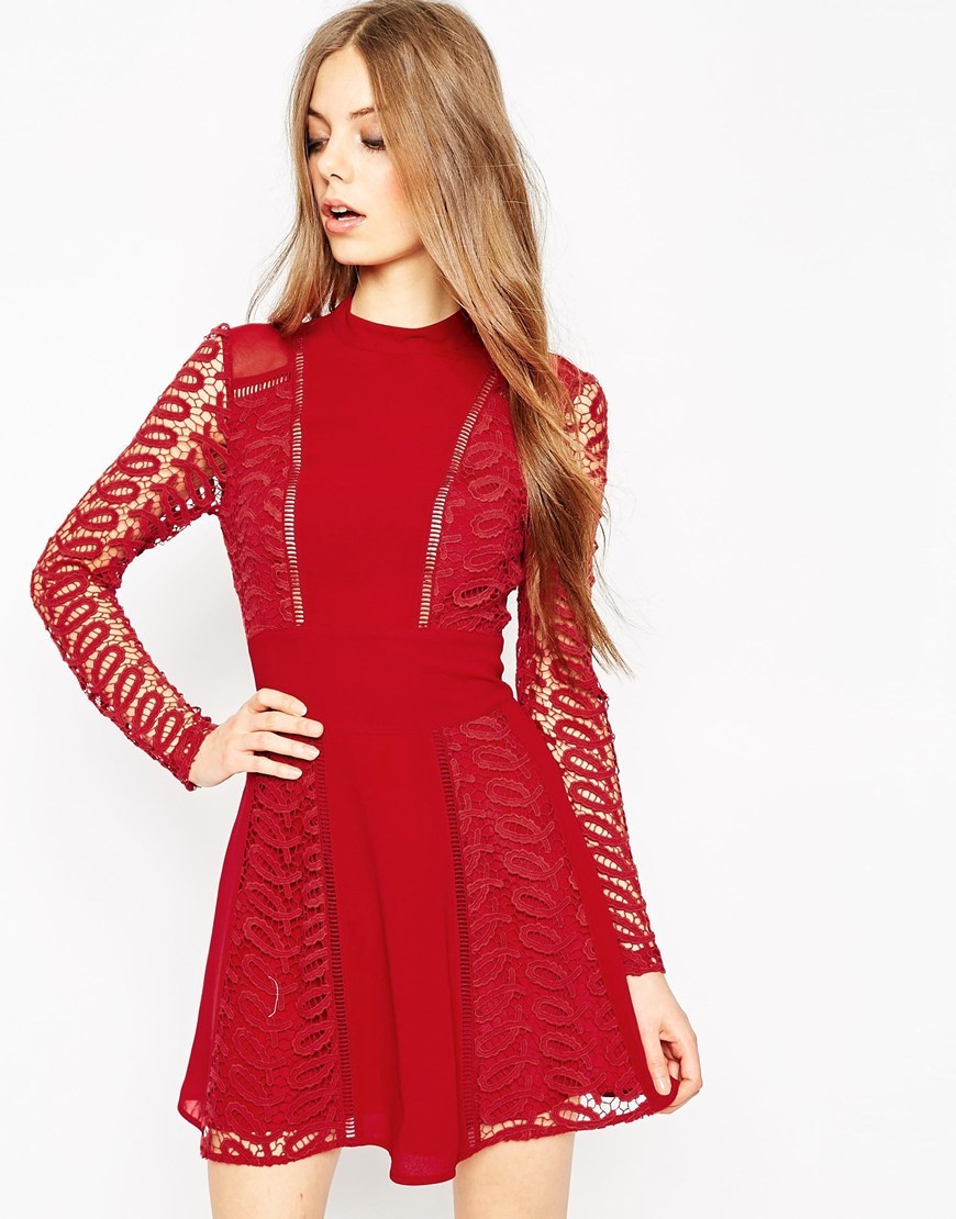 Premium Lace And Ladder Detail Dress Red - style: shift; length: mini; neckline: high neck; back detail: low cut/open back; predominant colour: true red; occasions: evening; fit: soft a-line; fibres: polyester/polyamide - 100%; hip detail: soft pleats at hip/draping at hip/flared at hip; sleeve length: long sleeve; sleeve style: standard; pattern type: fabric; pattern size: standard; pattern: patterned/print; texture group: woven light midweight; embellishment: lace; season: a/w 2015