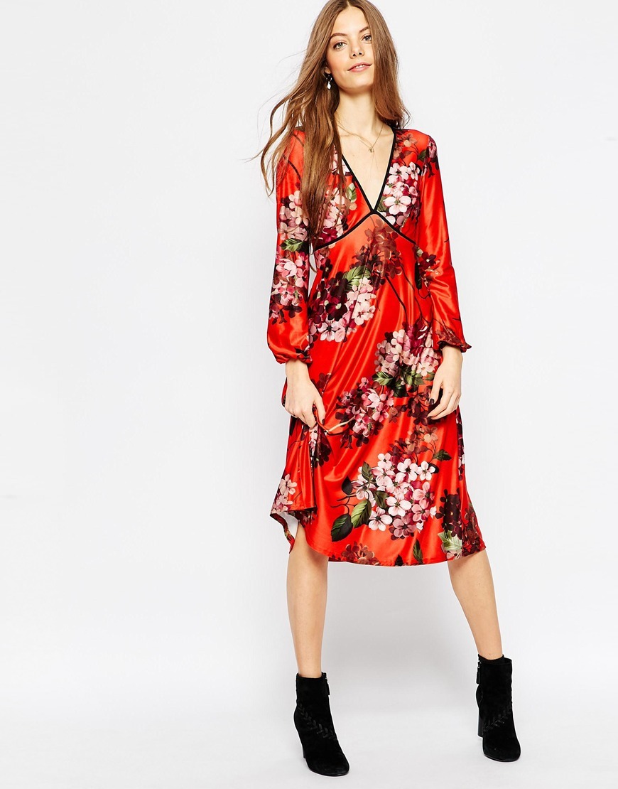 Midi Dress In Floral Print With Piping Detail Print - style: empire line; length: below the knee; neckline: low v-neck; fit: empire; sleeve style: balloon; predominant colour: bright orange; occasions: casual; fibres: polyester/polyamide - 100%; hip detail: soft pleats at hip/draping at hip/flared at hip; sleeve length: long sleeve; pattern type: fabric; pattern size: big & busy; pattern: florals; texture group: woven light midweight; season: a/w 2015; trends: folky 70s