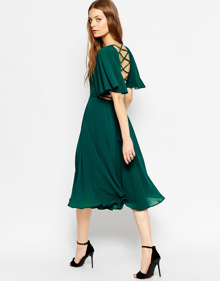 Lace Up Back Kaftan Sleeve Midi Dress Ivory - length: below the knee; neckline: round neck; sleeve style: angel/waterfall; pattern: plain; back detail: low cut/open back; predominant colour: emerald green; occasions: evening, occasion; fit: fitted at waist & bust; style: fit & flare; fibres: polyester/polyamide - 100%; sleeve length: half sleeve; pattern type: fabric; texture group: jersey - stretchy/drapey; season: a/w 2015