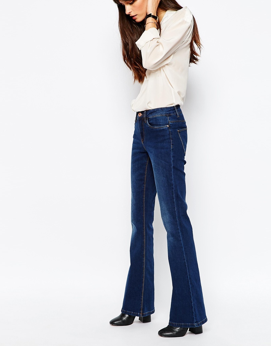 70's Flare Jean Blue - style: flares; length: standard; pattern: plain; pocket detail: traditional 5 pocket; waist: mid/regular rise; predominant colour: royal blue; occasions: casual; fibres: cotton - stretch; jeans detail: shading down centre of thigh; texture group: denim; pattern type: fabric; season: a/w 2015