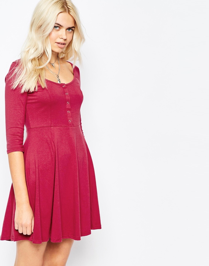 Button Through Skater Dress With Long Sleeve Grey - length: mid thigh; neckline: round neck; pattern: plain; bust detail: buttons at bust (in middle at breastbone)/zip detail at bust; predominant colour: pink; occasions: casual; fit: fitted at waist & bust; style: fit & flare; fibres: cotton - 100%; sleeve length: 3/4 length; sleeve style: standard; pattern type: fabric; texture group: jersey - stretchy/drapey; season: a/w 2015