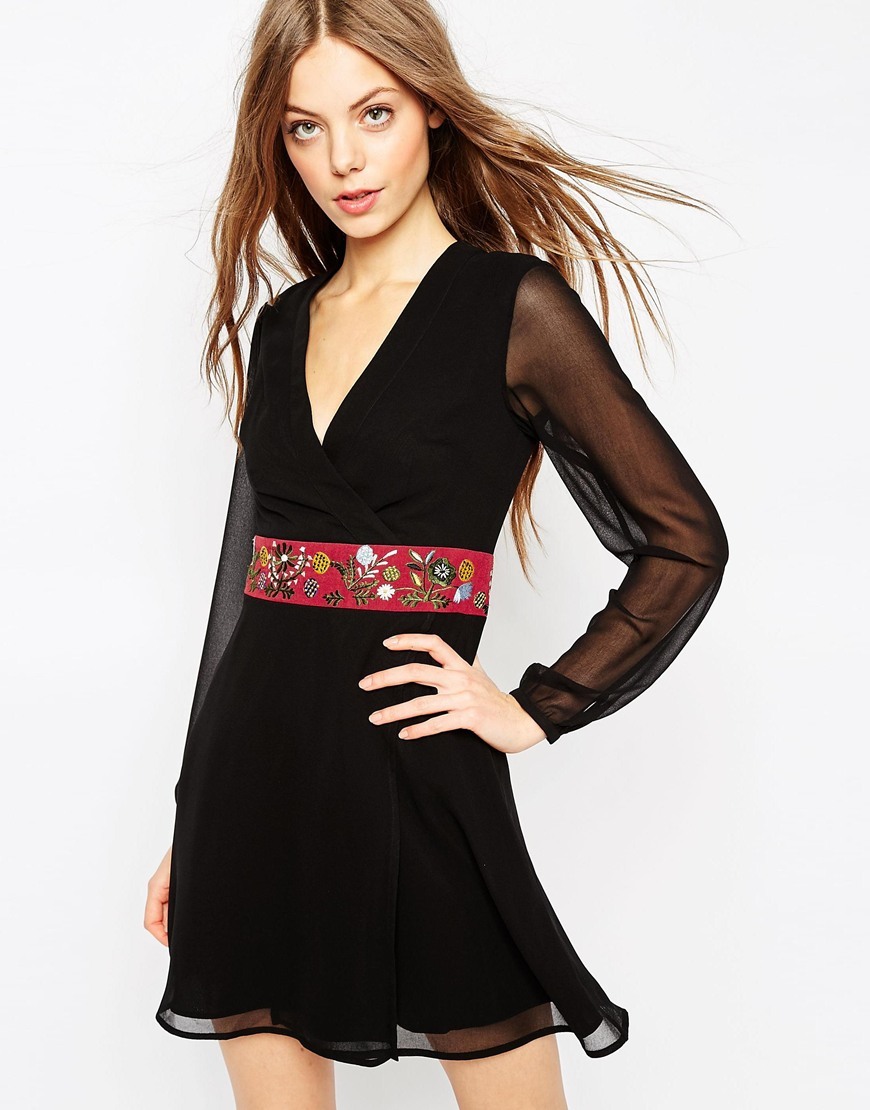 Embroidered Mini Wrap Dress Black - style: faux wrap/wrap; length: mid thigh; neckline: v-neck; pattern: plain; waist detail: belted waist/tie at waist/drawstring; predominant colour: black; occasions: evening; fit: body skimming; fibres: polyester/polyamide - 100%; sleeve length: long sleeve; sleeve style: standard; pattern type: fabric; texture group: other - light to midweight; season: a/w 2015