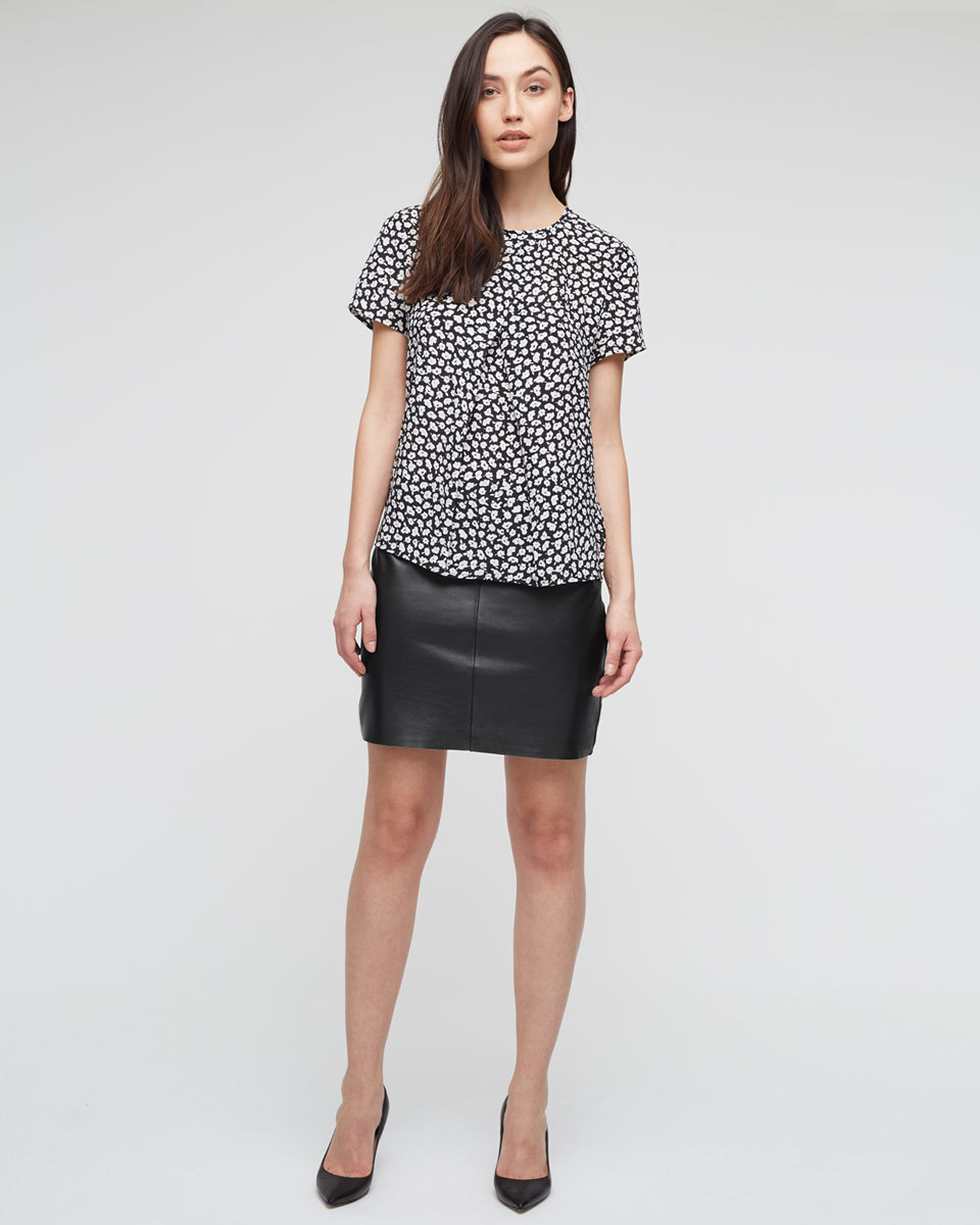 Leather Mini Skirt - length: mid thigh; pattern: plain; style: straight; fit: body skimming; waist: mid/regular rise; predominant colour: black; occasions: casual, evening, creative work; fibres: leather - 100%; texture group: leather; pattern type: fabric; pattern size: standard (bottom); season: a/w 2015