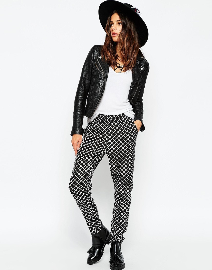 Woven Peg Trousers In Mono Geo Print Mono - length: standard; style: harem/slouch; waist: mid/regular rise; secondary colour: white; predominant colour: mint green; occasions: casual, creative work; fibres: viscose/rayon - 100%; hip detail: front pleats at hip level; waist detail: narrow waistband; texture group: crepes; fit: tapered; pattern type: fabric; pattern: patterned/print; pattern size: light/subtle (bottom); season: a/w 2015