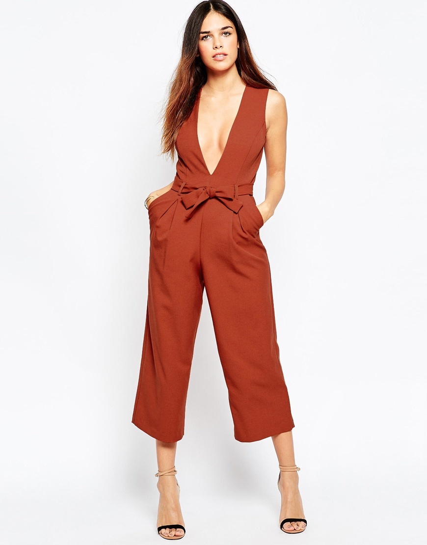 Plunge Jumpsuit With Midi Leg Burnt Orange - neckline: plunge; pattern: plain; sleeve style: sleeveless; predominant colour: terracotta; occasions: evening, occasion; length: calf length; fit: fitted at waist & bust; fibres: polyester/polyamide - 100%; sleeve length: sleeveless; style: jumpsuit; pattern type: fabric; texture group: other - light to midweight; season: a/w 2015