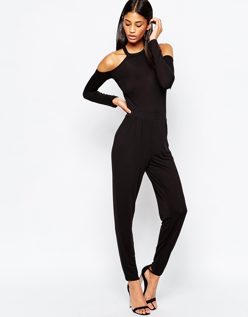 Jersey Jumpsuit With Cold Shoulder Black - length: standard; neckline: round neck; pattern: plain; predominant colour: black; occasions: evening, occasion; fit: body skimming; fibres: viscose/rayon - stretch; shoulder detail: cut out shoulder; sleeve length: long sleeve; sleeve style: standard; texture group: crepes; style: jumpsuit; pattern type: fabric; season: a/w 2015