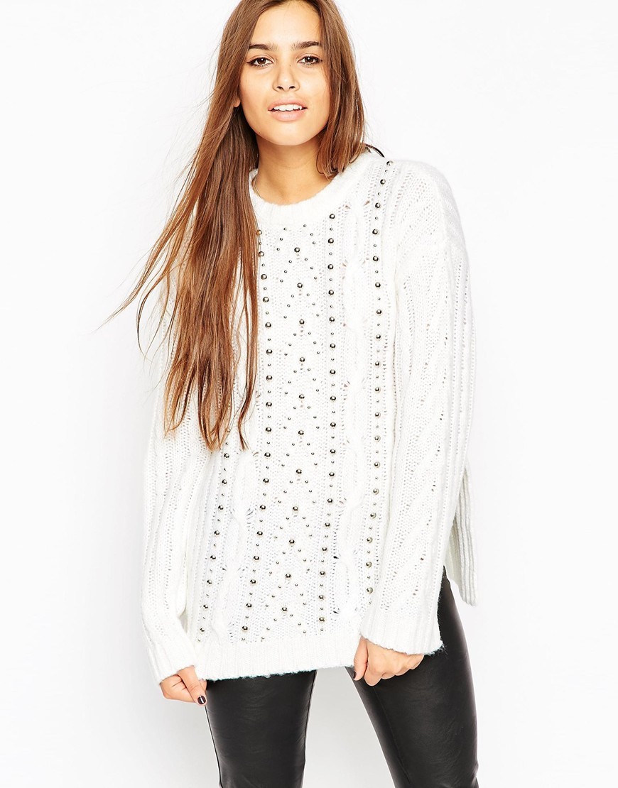 Oversized Cable Jumper With Stud Detail Cream - neckline: round neck; length: below the bottom; style: standard; pattern: cable knit; predominant colour: white; occasions: casual, creative work; fibres: acrylic - mix; fit: loose; shoulder detail: added shoulder detail; sleeve length: long sleeve; sleeve style: standard; texture group: knits/crochet; pattern type: knitted - other; pattern size: light/subtle; season: a/w 2015