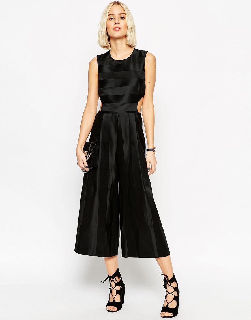 Premium Jumpsuit With Satin Stripe And Cut Out Detail Black - neckline: round neck; fit: fitted at waist; pattern: plain; sleeve style: sleeveless; predominant colour: black; occasions: evening, occasion; length: calf length; fibres: polyester/polyamide - 100%; sleeve length: sleeveless; style: jumpsuit; pattern type: fabric; texture group: other - light to midweight; season: a/w 2015