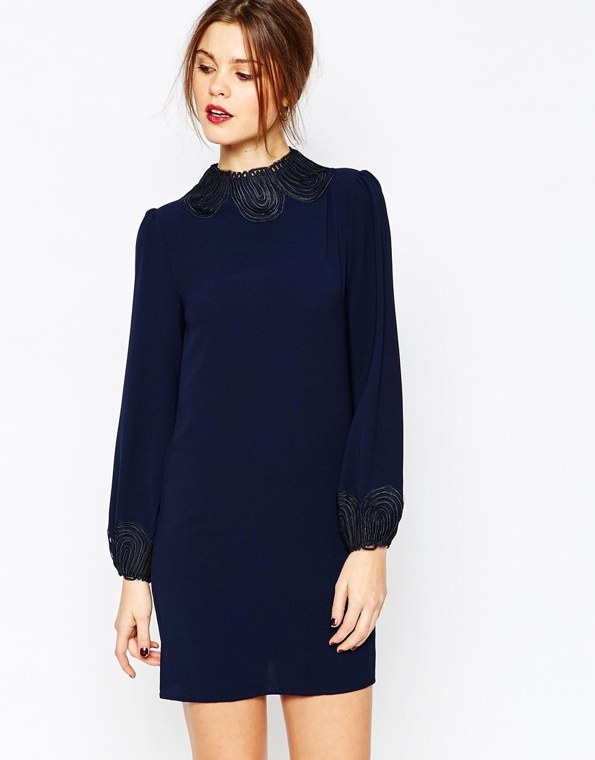 Cord Trim Dress Navy - style: shift; length: mid thigh; pattern: plain; neckline: high neck; predominant colour: navy; occasions: evening; fit: body skimming; fibres: polyester/polyamide - 100%; sleeve length: long sleeve; sleeve style: standard; texture group: crepes; pattern type: fabric; embellishment: applique; season: a/w 2015
