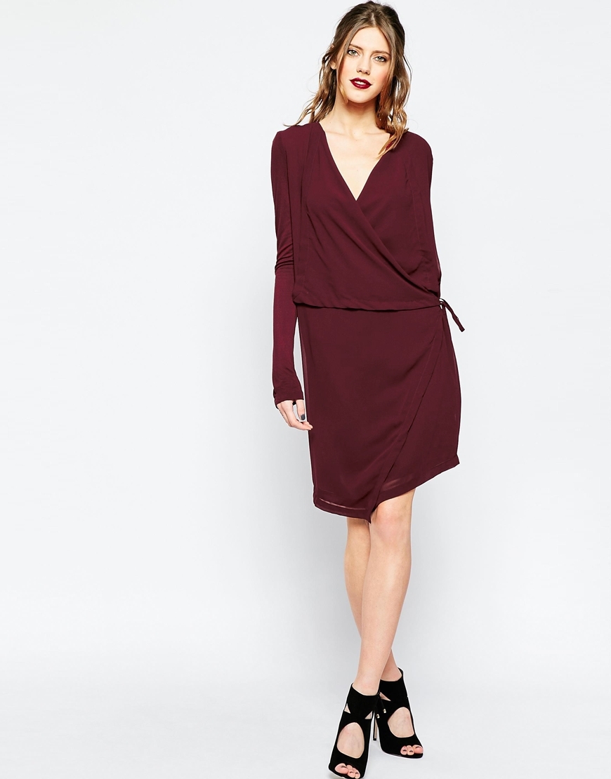 Stream Wrap Dress Black Blum - style: faux wrap/wrap; neckline: low v-neck; pattern: plain; waist detail: belted waist/tie at waist/drawstring; predominant colour: burgundy; occasions: evening, work, occasion; length: just above the knee; fit: body skimming; fibres: cotton - 100%; sleeve length: long sleeve; sleeve style: standard; pattern type: fabric; texture group: woven light midweight; season: a/w 2015