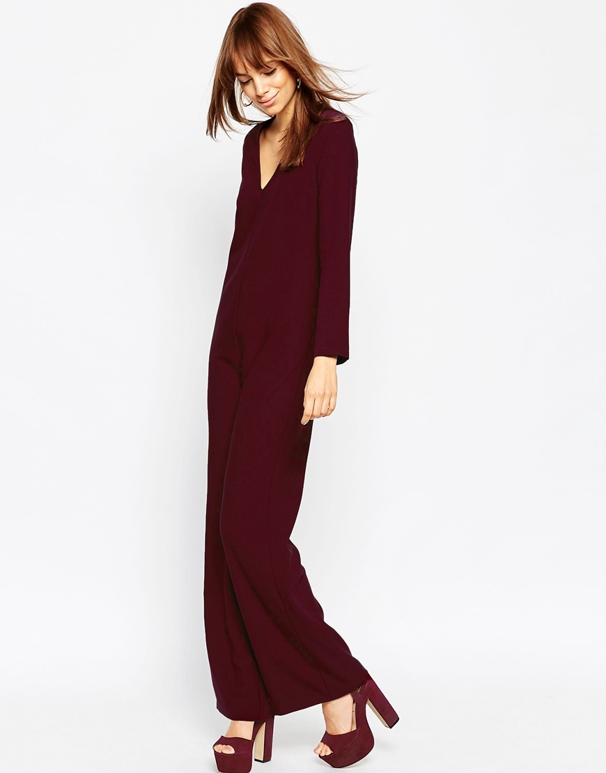 Clean Jumpsuit With V Neck Aubergine - neckline: plunge; pattern: plain; predominant colour: burgundy; occasions: evening; length: ankle length; fit: straight cut; fibres: cotton - 100%; sleeve length: long sleeve; sleeve style: standard; style: jumpsuit; pattern type: fabric; texture group: woven light midweight; season: a/w 2015