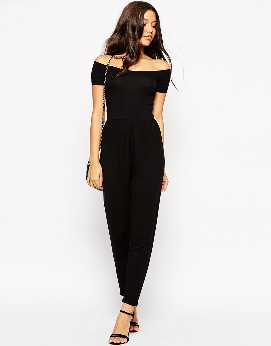 Bardot Jersey Jumpsuit With Peg Leg Black - neckline: off the shoulder; sleeve style: capped; pattern: plain; predominant colour: black; occasions: casual, evening; length: ankle length; fit: body skimming; fibres: viscose/rayon - stretch; sleeve length: short sleeve; style: jumpsuit; pattern type: fabric; texture group: jersey - stretchy/drapey; season: a/w 2015