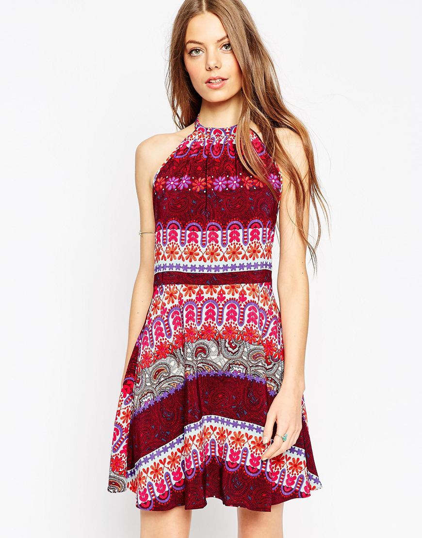 Skater Sundress In Bright Stripe Embossed Print Multi Stripe - sleeve style: sleeveless; neckline: low halter neck; secondary colour: pink; predominant colour: burgundy; occasions: evening; length: just above the knee; fit: fitted at waist & bust; style: fit & flare; fibres: viscose/rayon - 100%; sleeve length: sleeveless; pattern type: fabric; pattern: patterned/print; texture group: jersey - stretchy/drapey; multicoloured: multicoloured; season: a/w 2015