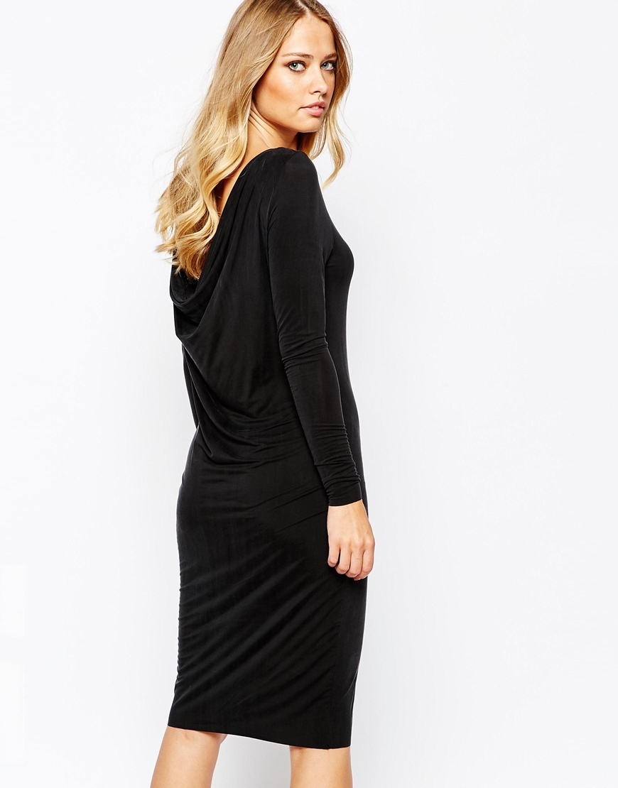 Mariann Long Sleeve Dress Black - style: shift; neckline: slash/boat neckline; pattern: plain; back detail: cowl/draping/scoop at back; predominant colour: black; occasions: evening, occasion; length: just above the knee; fit: body skimming; fibres: polyester/polyamide - stretch; sleeve length: long sleeve; sleeve style: standard; pattern type: fabric; texture group: jersey - stretchy/drapey; season: a/w 2015