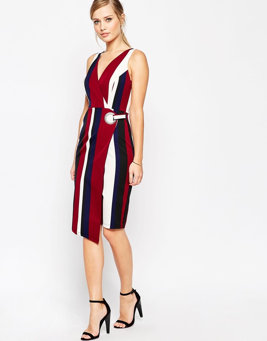 Wrap Pencil Dress In Bold Stripe Print With Eyelet Print - style: faux wrap/wrap; neckline: low v-neck; sleeve style: standard vest straps/shoulder straps; pattern: vertical stripes; predominant colour: burgundy; secondary colour: navy; occasions: evening, occasion; length: on the knee; fit: fitted at waist & bust; fibres: polyester/polyamide - 100%; sleeve length: sleeveless; pattern type: fabric; pattern size: standard; texture group: other - light to midweight; multicoloured: multicoloured; season: a/w 2015