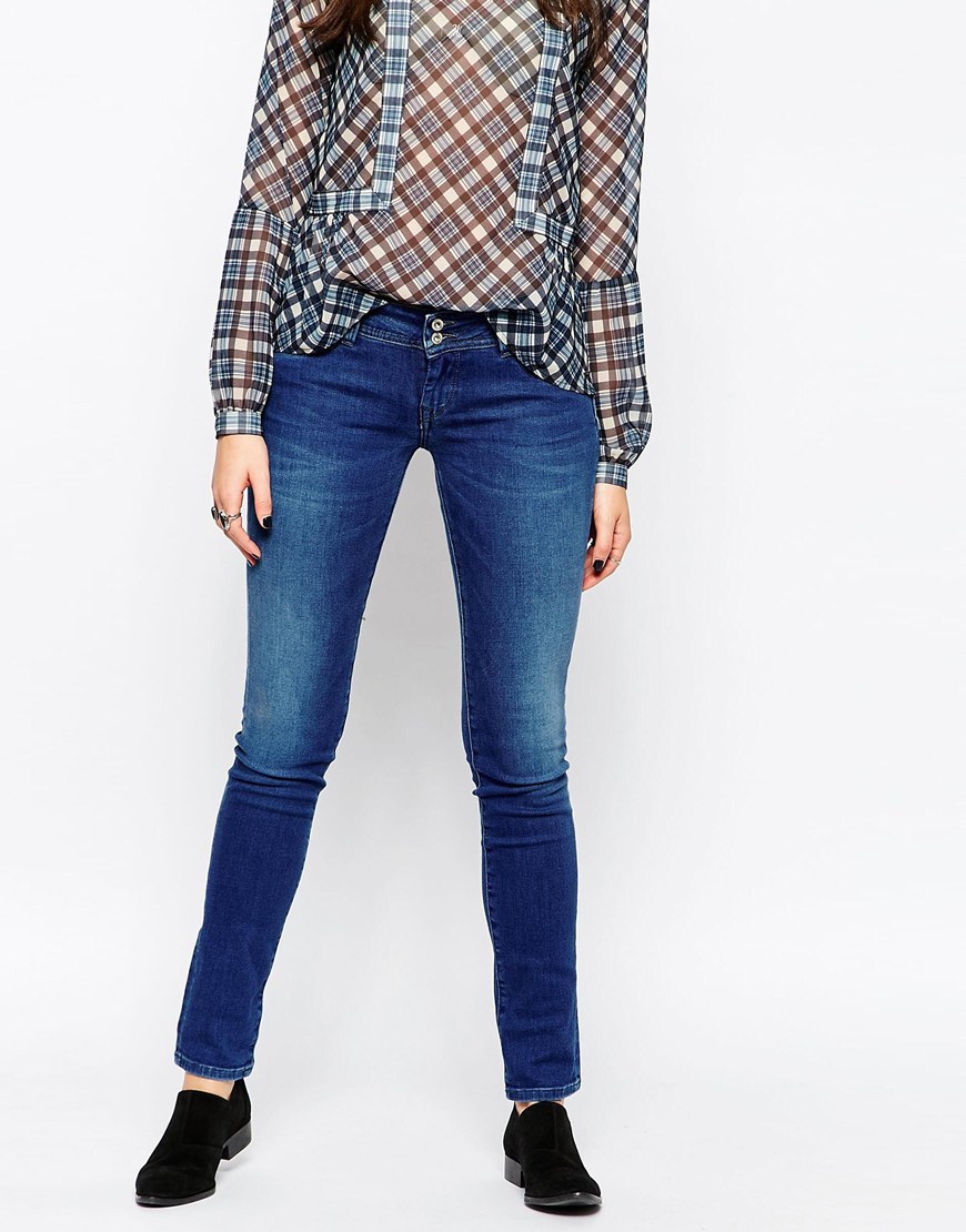 Divine Skinny Jean Blue - style: skinny leg; length: standard; pattern: plain; pocket detail: traditional 5 pocket; waist: mid/regular rise; predominant colour: navy; occasions: casual; fibres: cotton - stretch; jeans detail: shading down centre of thigh; texture group: denim; pattern type: fabric; season: a/w 2015