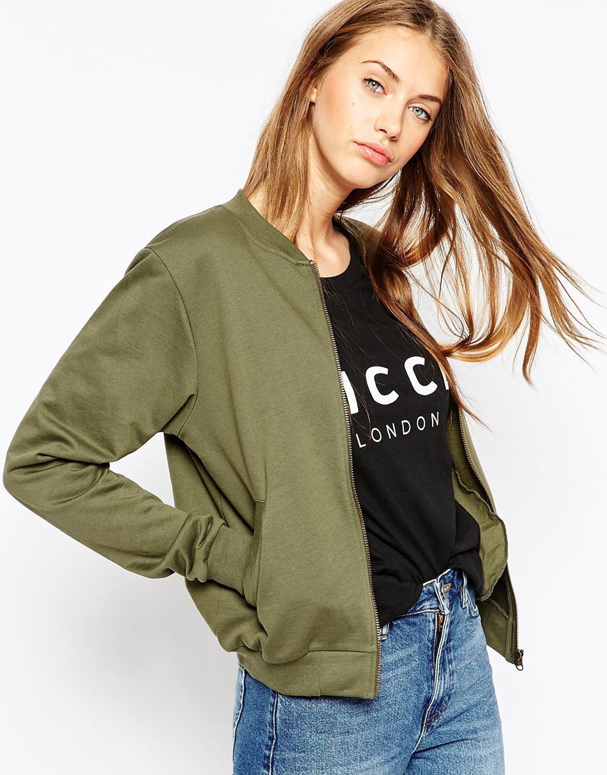 The Bomber Jacket In Jersey Khaki - pattern: plain; collar: round collar/collarless; style: bomber; predominant colour: khaki; occasions: casual, creative work; length: standard; fit: straight cut (boxy); sleeve length: long sleeve; sleeve style: standard; collar break: high; pattern type: fabric; texture group: jersey - stretchy/drapey; season: a/w 2015