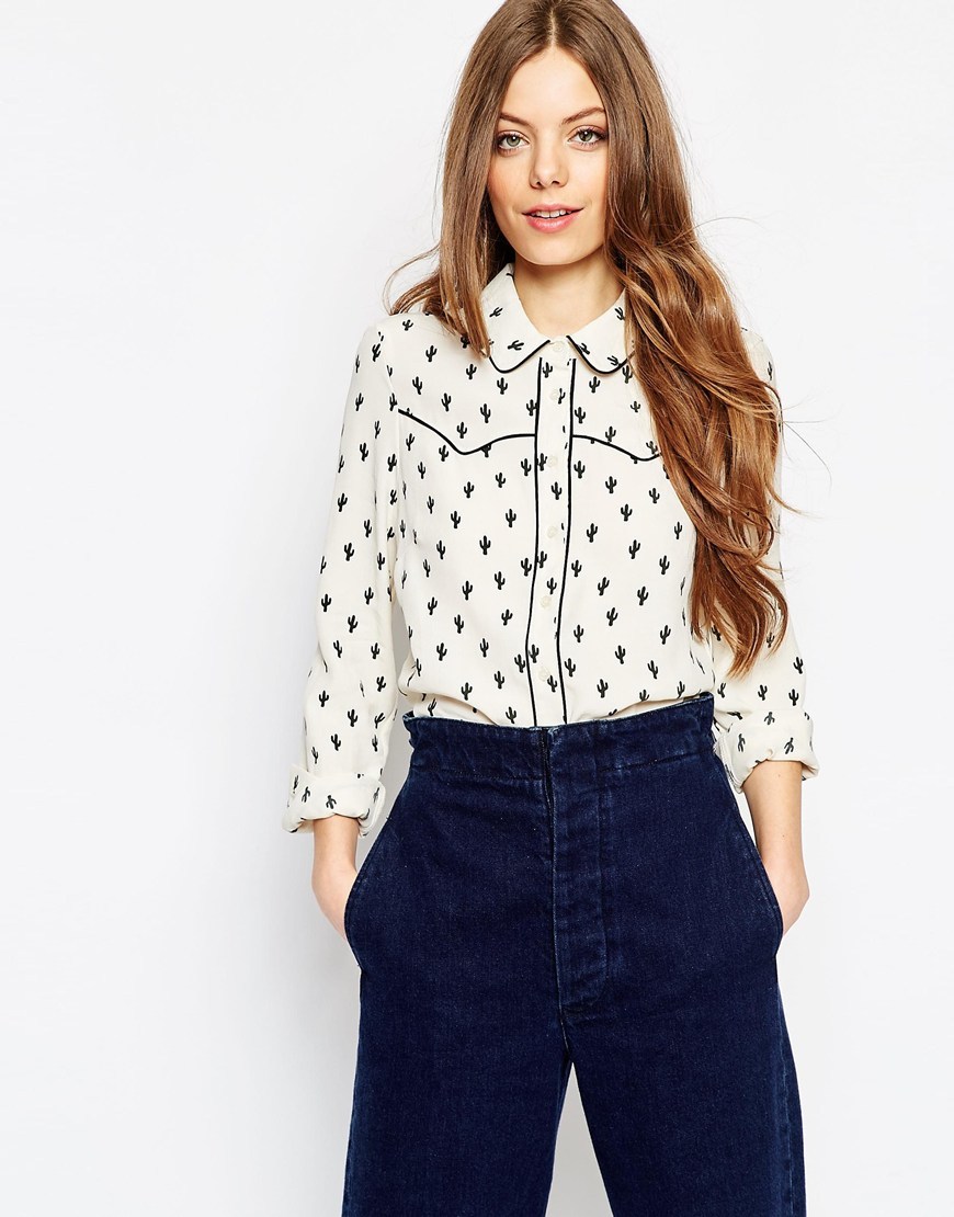 Western Blouse In Cactus Print Ivory - neckline: shirt collar/peter pan/zip with opening; style: shirt; predominant colour: white; secondary colour: navy; occasions: casual, creative work; length: standard; fibres: polyester/polyamide - 100%; fit: straight cut; sleeve length: long sleeve; sleeve style: standard; pattern type: fabric; pattern size: standard; pattern: patterned/print; texture group: woven light midweight; season: a/w 2015