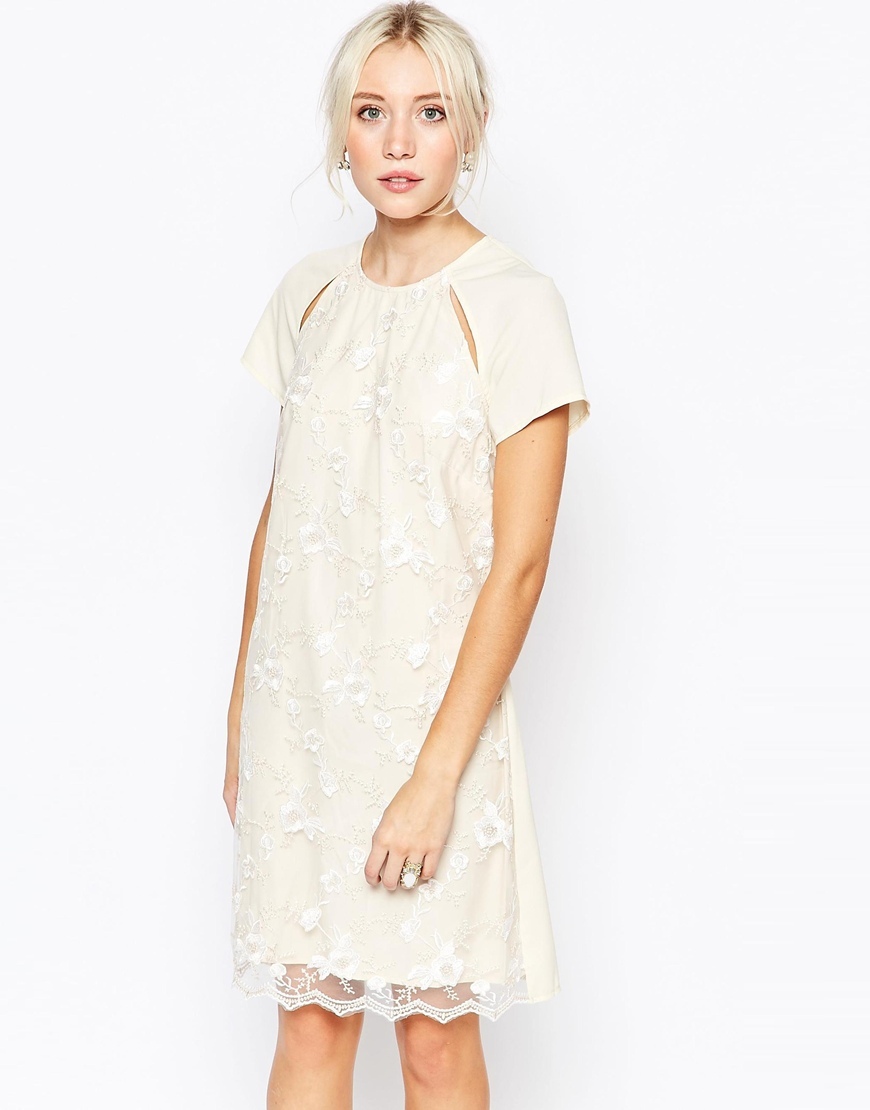 Embroidered Cut Out Tunic Dress Cream - style: tunic; sleeve style: raglan; predominant colour: ivory/cream; occasions: evening, occasion; length: just above the knee; fit: straight cut; fibres: polyester/polyamide - 100%; neckline: crew; shoulder detail: cut out shoulder; sleeve length: short sleeve; texture group: lace; pattern type: fabric; pattern size: standard; pattern: patterned/print; embellishment: embroidered; season: a/w 2015
