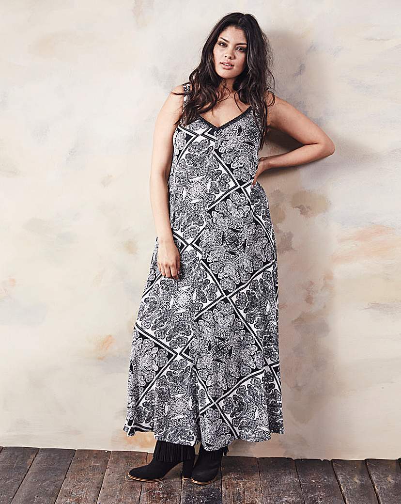 Black/Ivory Paisley Print Maxi Dress - neckline: low v-neck; sleeve style: sleeveless; style: maxi dress; length: ankle length; secondary colour: white; predominant colour: black; occasions: casual; fit: soft a-line; fibres: polyester/polyamide - stretch; hip detail: soft pleats at hip/draping at hip/flared at hip; sleeve length: sleeveless; pattern type: fabric; pattern: patterned/print; texture group: jersey - stretchy/drapey; season: a/w 2015