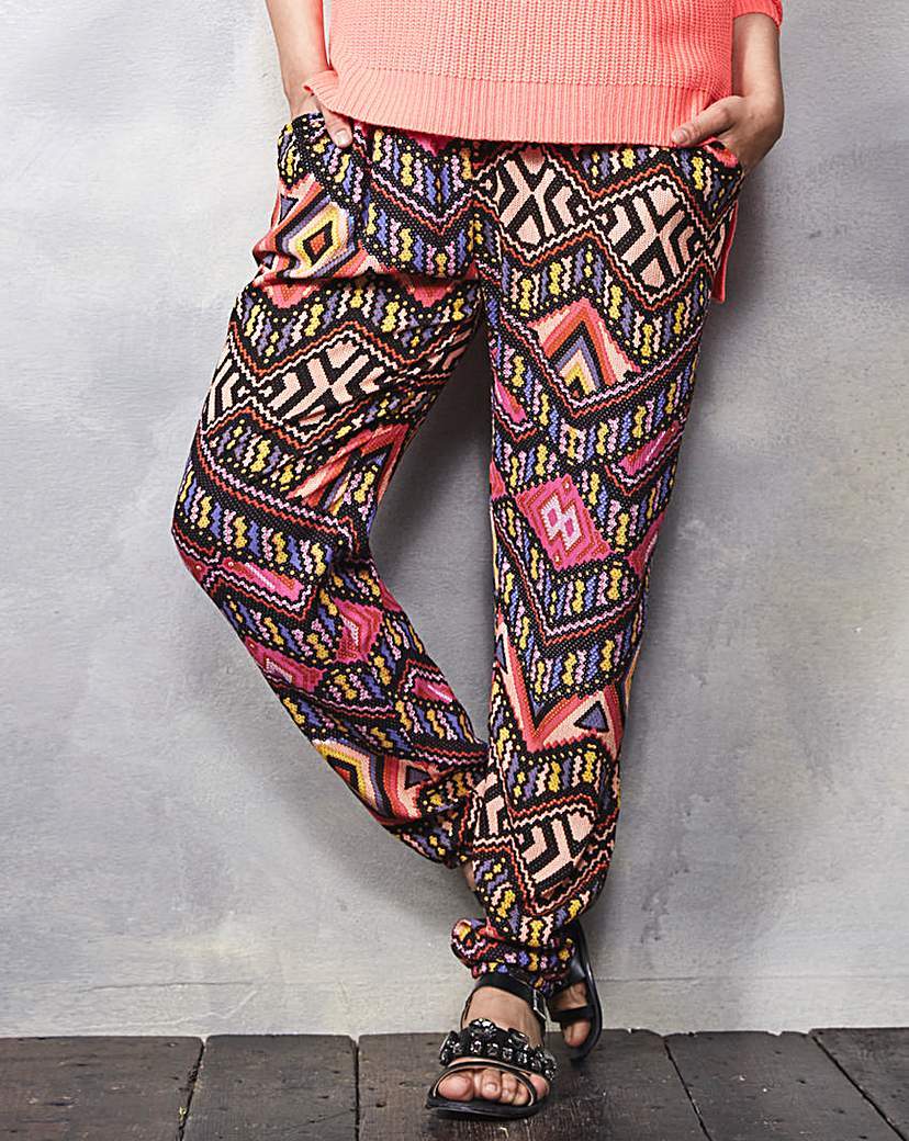 Crinkle Hareem Trousers - length: standard; style: harem/slouch; waist: mid/regular rise; secondary colour: hot pink; predominant colour: black; occasions: casual; fibres: viscose/rayon - 100%; texture group: cotton feel fabrics; fit: baggy; pattern type: fabric; pattern: patterned/print; pattern size: big & busy (bottom); season: a/w 2015