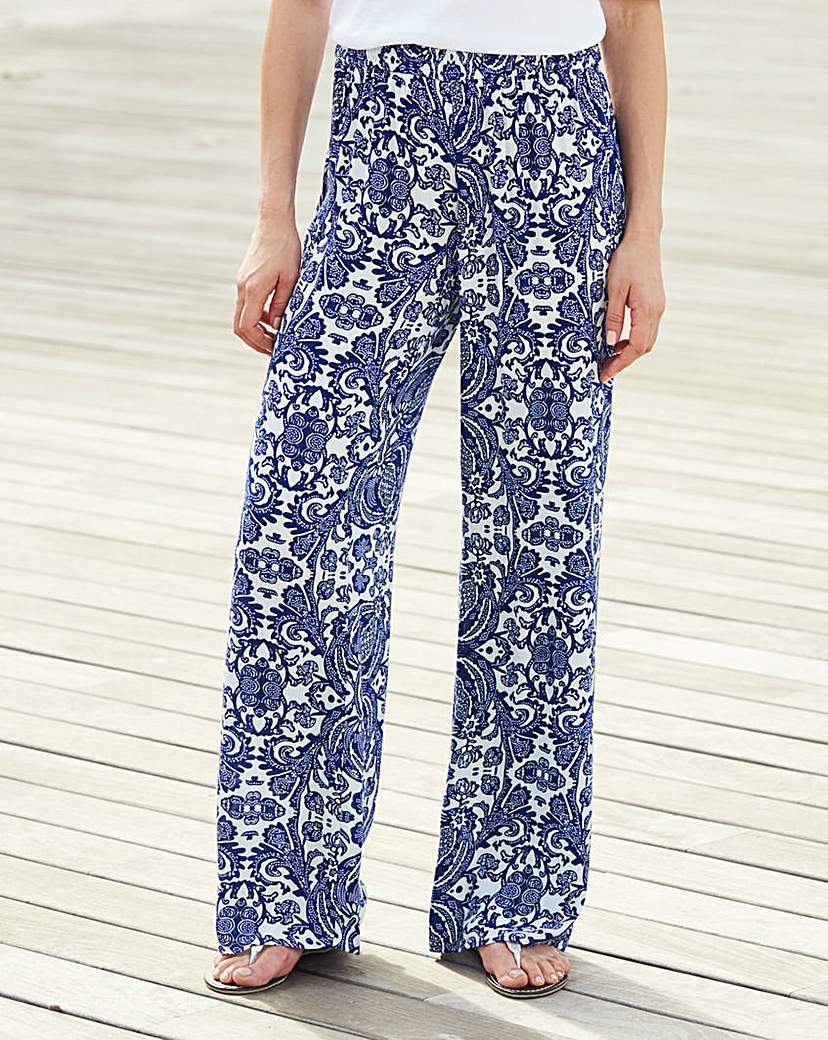 Crinkle Wide Leg Trousers Short - length: standard; waist detail: belted waist/tie at waist/drawstring; waist: mid/regular rise; secondary colour: white; predominant colour: royal blue; occasions: casual; fibres: viscose/rayon - stretch; texture group: cotton feel fabrics; fit: wide leg; pattern type: fabric; pattern: patterned/print; style: standard; pattern size: big & busy (bottom); season: a/w 2015