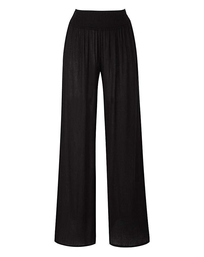 Crinkle Wide Leg Trouser Regular - length: standard; pattern: plain; waist: high rise; predominant colour: black; occasions: casual, creative work; fibres: viscose/rayon - 100%; waist detail: narrow waistband; fit: baggy; pattern type: fabric; texture group: jersey - stretchy/drapey; style: standard; season: a/w 2015