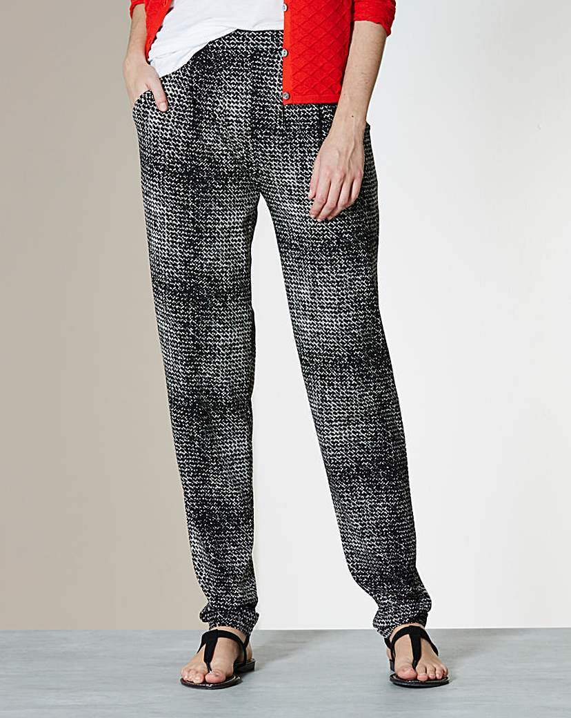 Printed Harem Jersey Trousers Regular - length: standard; style: harem/slouch; waist detail: elasticated waist; waist: mid/regular rise; secondary colour: white; predominant colour: black; occasions: casual; fibres: polyester/polyamide - stretch; trends: monochrome; fit: baggy; pattern type: fabric; pattern: patterned/print; texture group: jersey - stretchy/drapey; pattern size: big & busy (bottom); season: a/w 2015