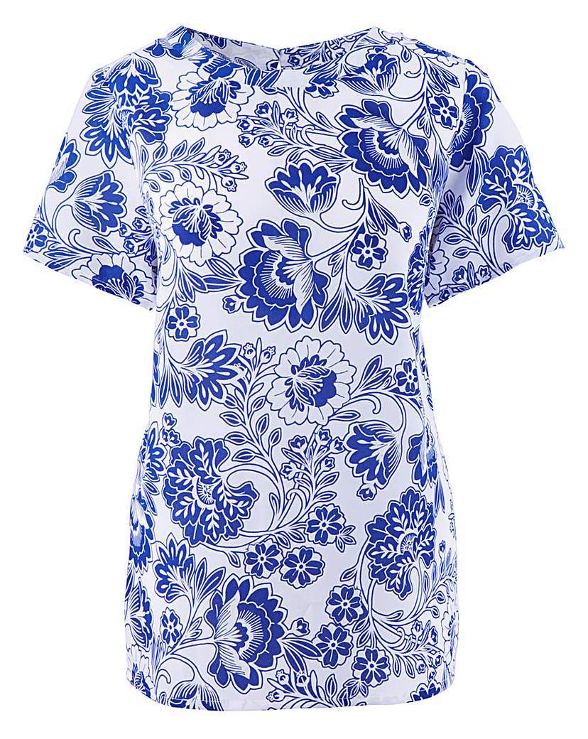 Blue Floral Shell Top - neckline: round neck; length: below the bottom; secondary colour: white; predominant colour: royal blue; occasions: casual; style: top; fibres: polyester/polyamide - 100%; fit: loose; sleeve length: short sleeve; sleeve style: standard; pattern type: fabric; pattern: florals; texture group: other - light to midweight; pattern size: big & busy (top); season: a/w 2015