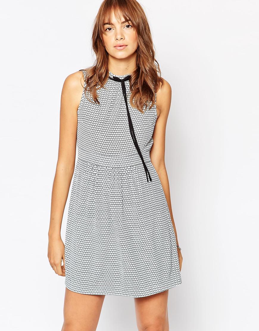 Tie Neck Sleeveless Dress Blue Print - length: mid thigh; sleeve style: sleeveless; neckline: high neck; pattern: polka dot; secondary colour: white; predominant colour: navy; occasions: casual; fit: fitted at waist & bust; style: fit & flare; fibres: polyester/polyamide - 100%; sleeve length: sleeveless; pattern type: fabric; texture group: other - light to midweight; season: a/w 2015