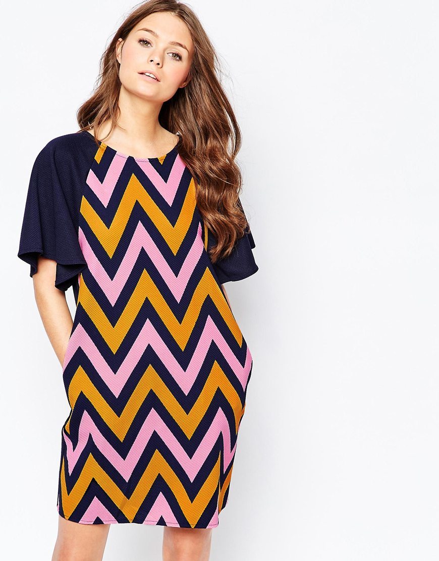 Curious Chevron Butterfly Kiss Dress Mustard/Pink - style: shift; length: mid thigh; neckline: round neck; sleeve style: angel/waterfall; shoulder detail: contrast pattern/fabric at shoulder; secondary colour: pink; predominant colour: navy; occasions: evening; fit: straight cut; fibres: polyester/polyamide - 100%; sleeve length: short sleeve; pattern type: fabric; pattern size: standard; pattern: patterned/print; texture group: woven light midweight; multicoloured: multicoloured; season: a/w 2015