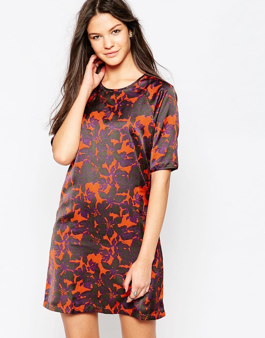 Floral Print Norah Dress Orange - style: tunic; length: mid thigh; neckline: round neck; secondary colour: bright orange; predominant colour: black; occasions: evening; fit: straight cut; fibres: polyester/polyamide - 100%; sleeve length: short sleeve; sleeve style: standard; texture group: structured shiny - satin/tafetta/silk etc.; pattern type: fabric; pattern size: standard; pattern: florals; multicoloured: multicoloured; season: a/w 2015