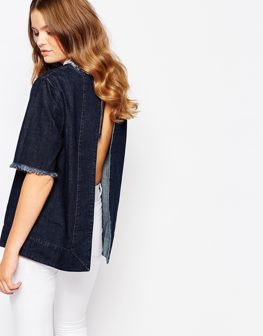 Jessika Open Back Denim Top Marcus Blue - pattern: plain; back detail: low cut/open back; predominant colour: navy; occasions: casual; length: standard; style: top; fibres: cotton - stretch; fit: straight cut; neckline: crew; sleeve length: short sleeve; sleeve style: standard; texture group: denim; pattern type: fabric; season: a/w 2015