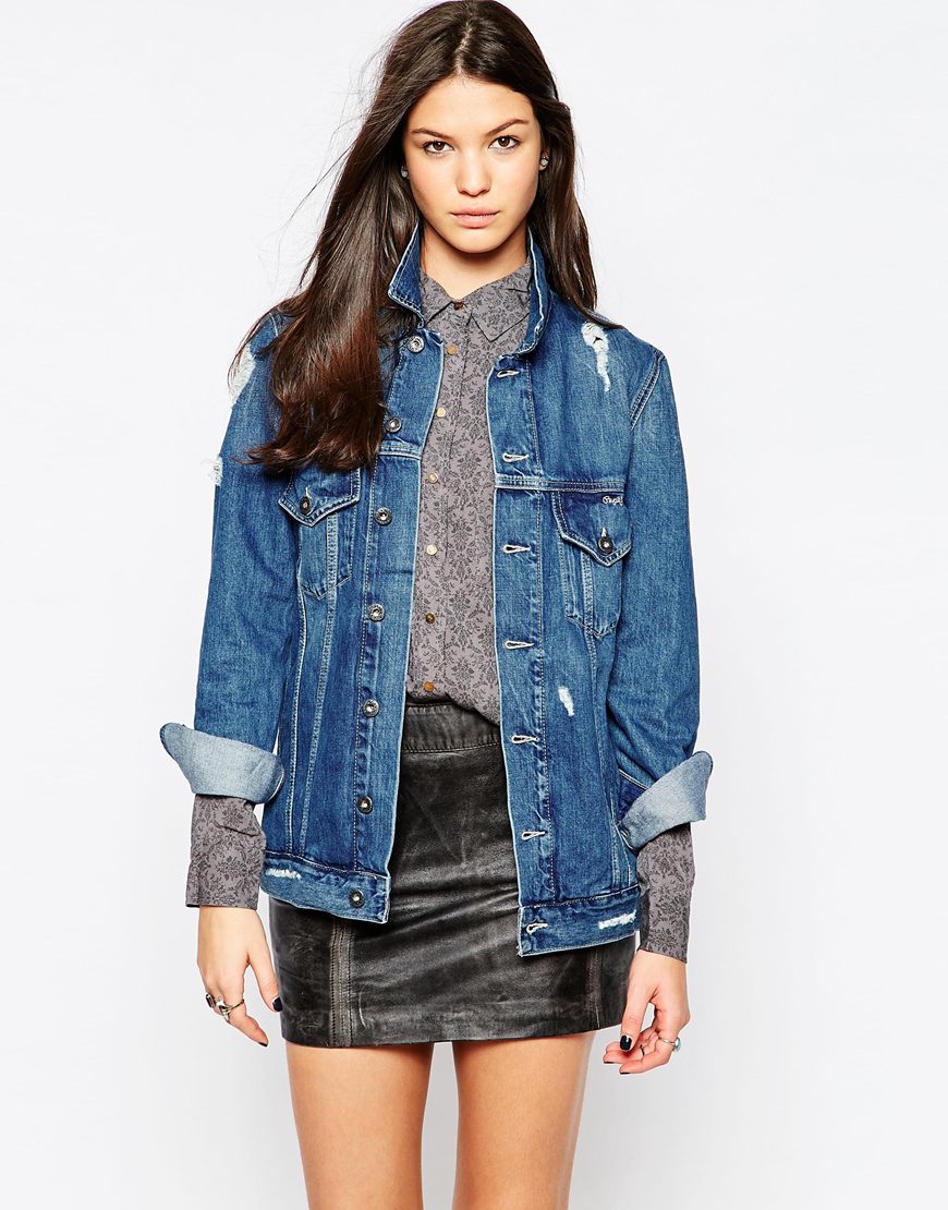 Riot Destructed Denim Jacket Blue - pattern: plain; length: below the bottom; style: denim; predominant colour: denim; occasions: casual, creative work; fit: straight cut (boxy); fibres: cotton - 100%; collar: shirt collar/peter pan/zip with opening; sleeve length: long sleeve; sleeve style: standard; texture group: denim; collar break: high/illusion of break when open; pattern type: fabric; season: a/w 2015