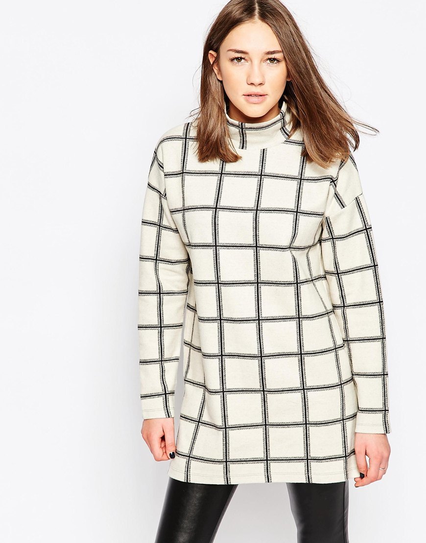 High Neck Grid Print Top Light Grey Mel - neckline: high neck; pattern: checked/gingham; length: below the bottom; predominant colour: white; secondary colour: black; occasions: casual, creative work; style: top; fibres: cotton - mix; fit: body skimming; sleeve length: long sleeve; sleeve style: standard; texture group: knits/crochet; pattern type: knitted - other; pattern size: light/subtle; season: a/w 2015